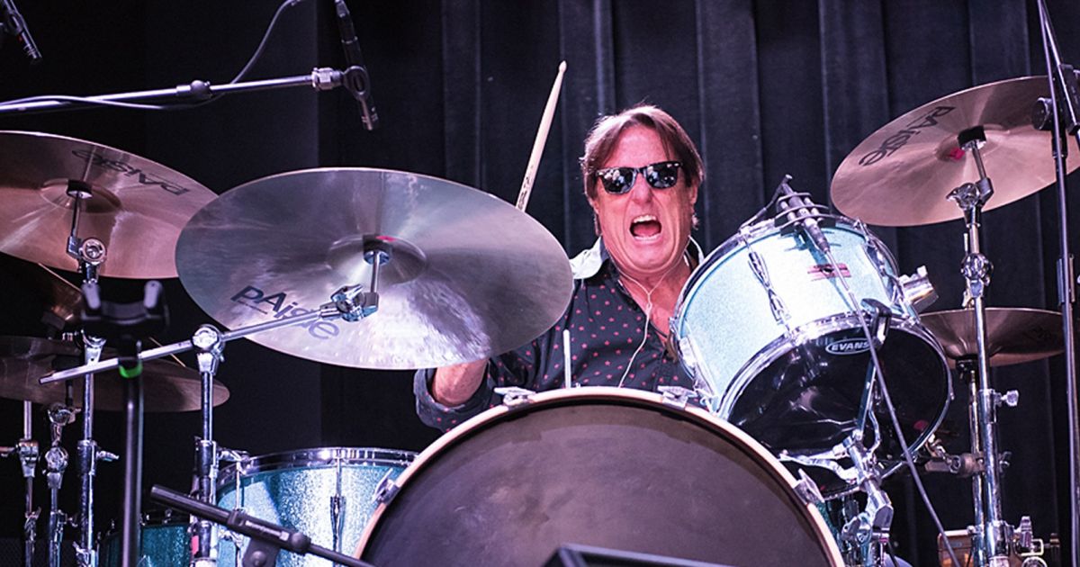 Prairie Prince performing on drums